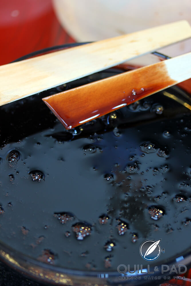 Bubbling urushi-lacquer workspace in the Angular Momentum atelier