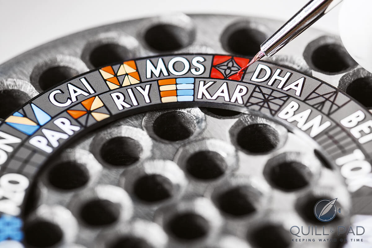 Hand painting a dial of a Louis Vuitton Escale Worldtim