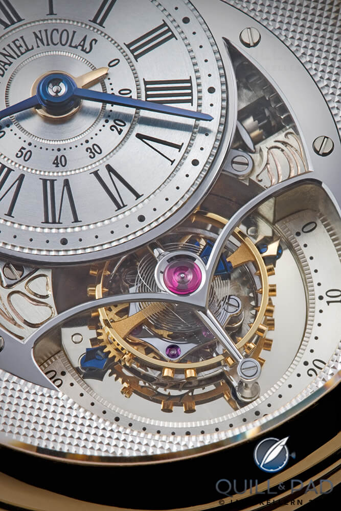 Exquisite tourbillon details of the Jean Daniel Nicolas Two-Minute Tourbillon by Mr. Daniel Roth. You can just make out the gold second hand on the left of tourbillon cage pointing to 60 and the blued-steel hand on the right pointing to 0.