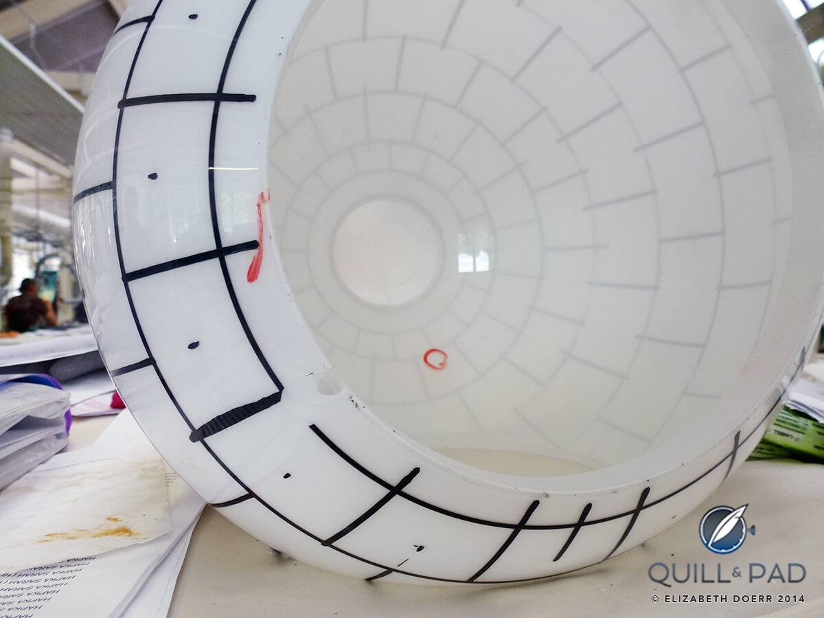 The hand blown glass is polished and marked ready for all of the holes to be carefully drilled