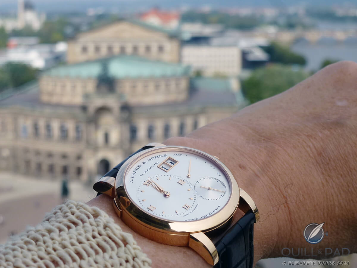 A. Lange & Söhne’s Lange 1 in red gold against the backdrop of Dresden’s Semper opera house
