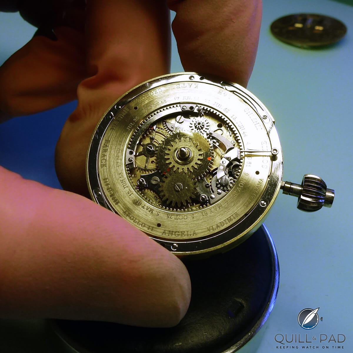 The complex arrangement of gears visible under the dial of a prototype Augustus