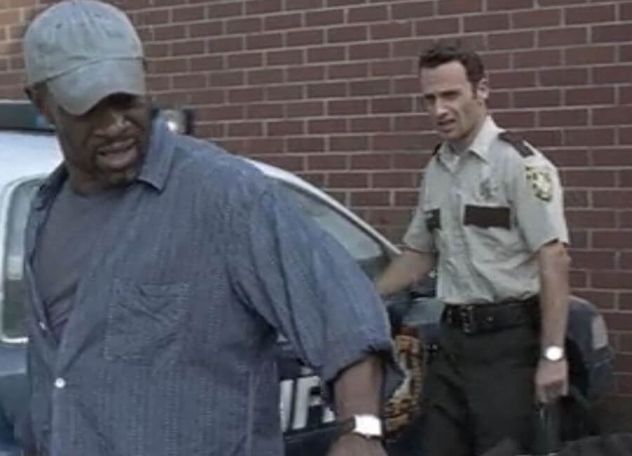 Morgan Jones (Lennie James) and Rick Grimes flash their timepieces in episode 1 of 'The Walking Dead'