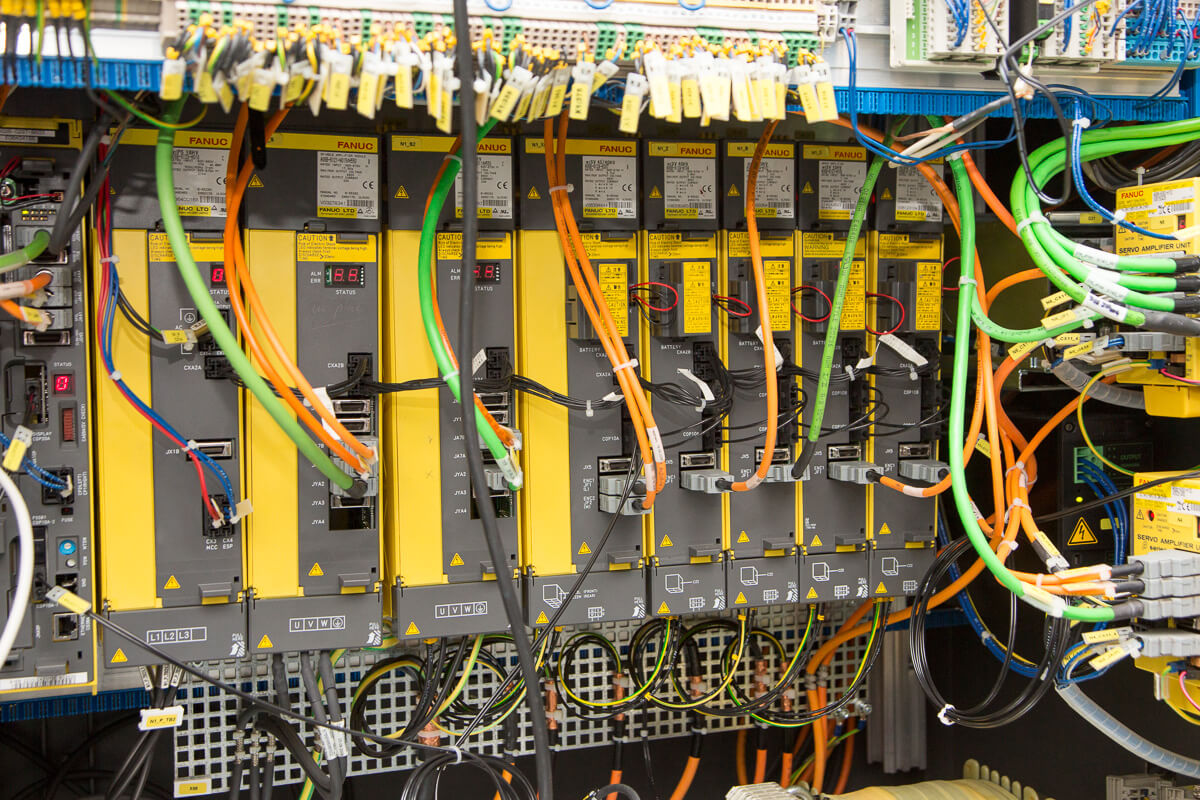 These represent the equivalent to 350 high-performance computer processors and they control the operation of a Valbray five-axis CNC machine