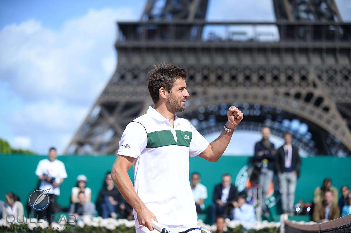 French Davis Cup captain Arnaud Clément playing an exhibition match on Longines' special court at the Eiffel Tower during Roland Garros 2015