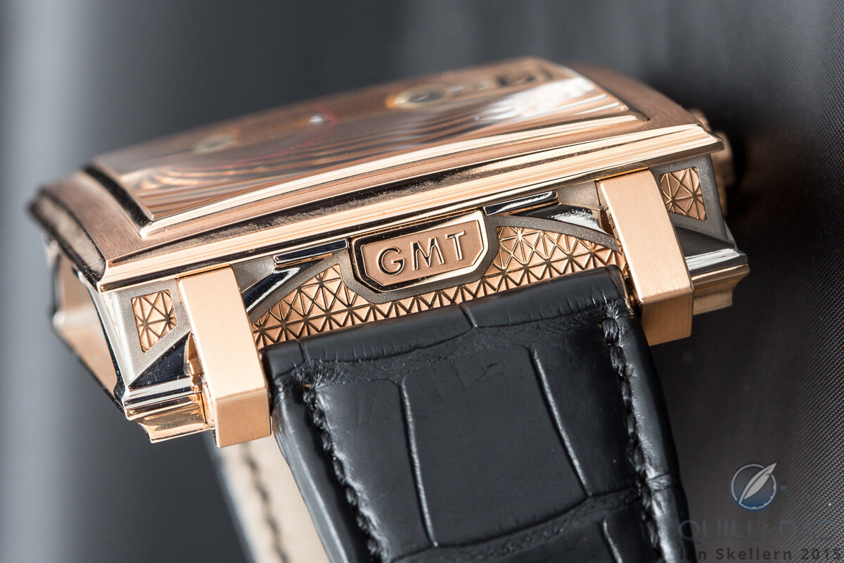Engraved GMT quick-set pusher between the lugs of the Jean Dunand Palace