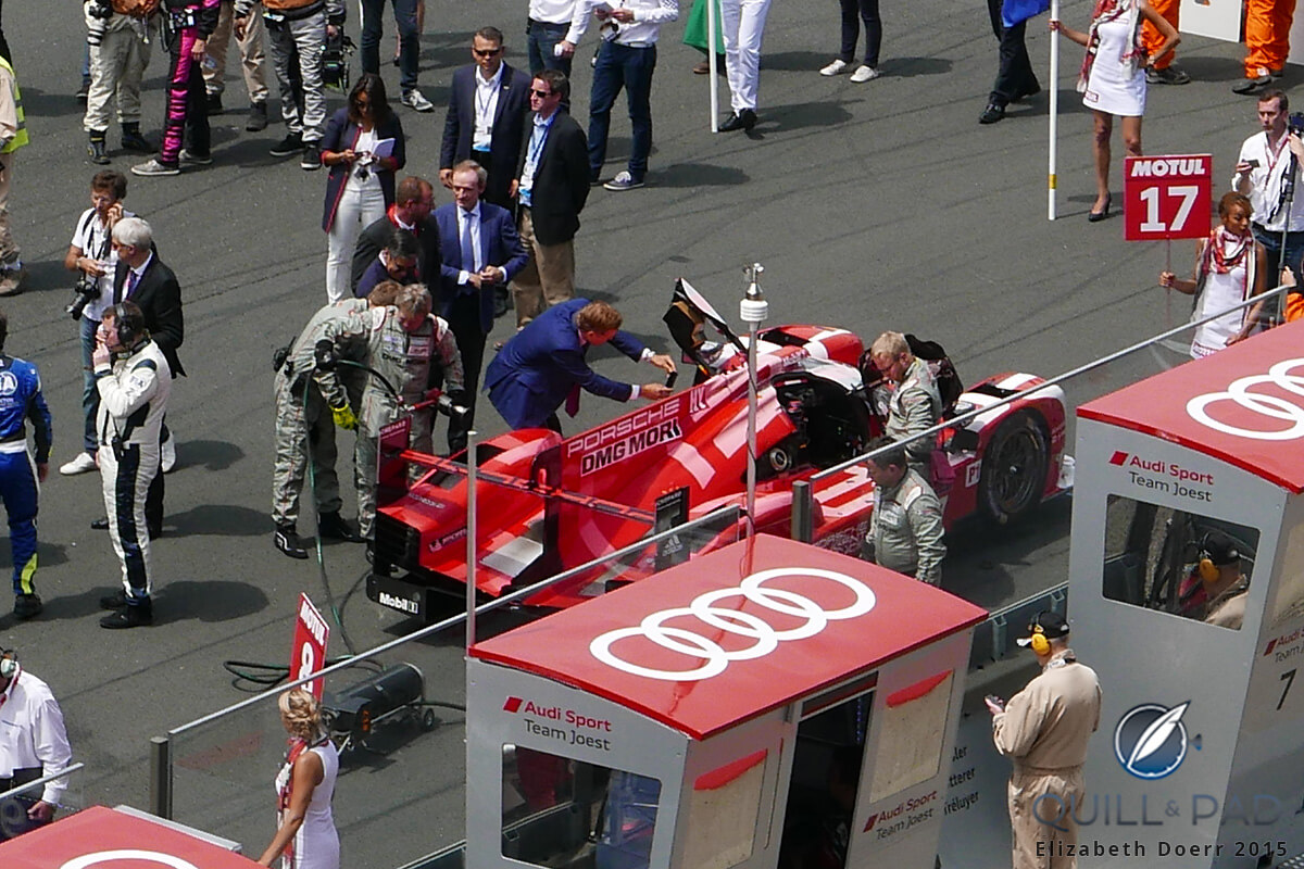 Rolex CEO Jean-Frédéric Dufour inspects the Porsches just before Le Mans 2015 begins