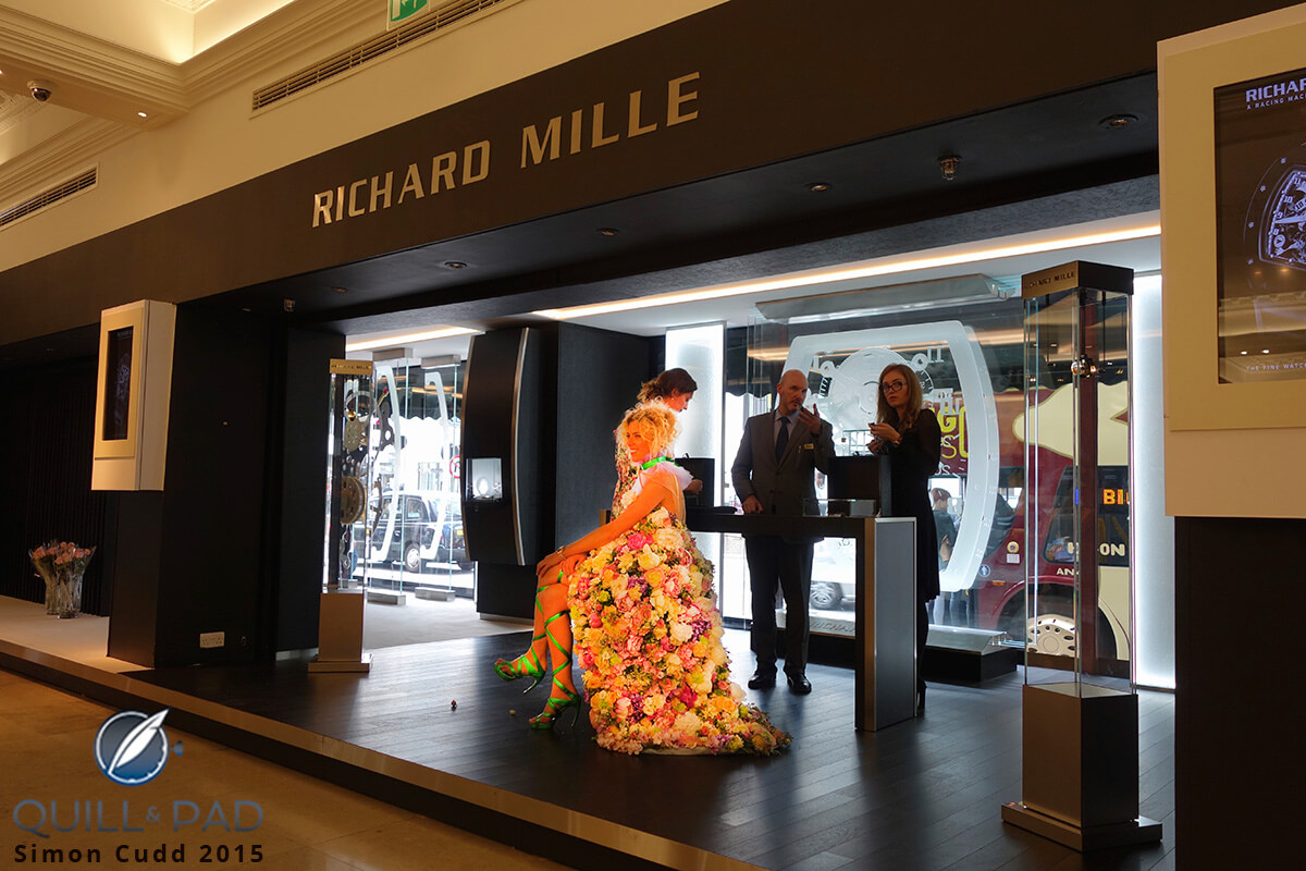 A Richard Mille model clothed in genuine flowers at Richard Mille's pop-up store at Harrod’s