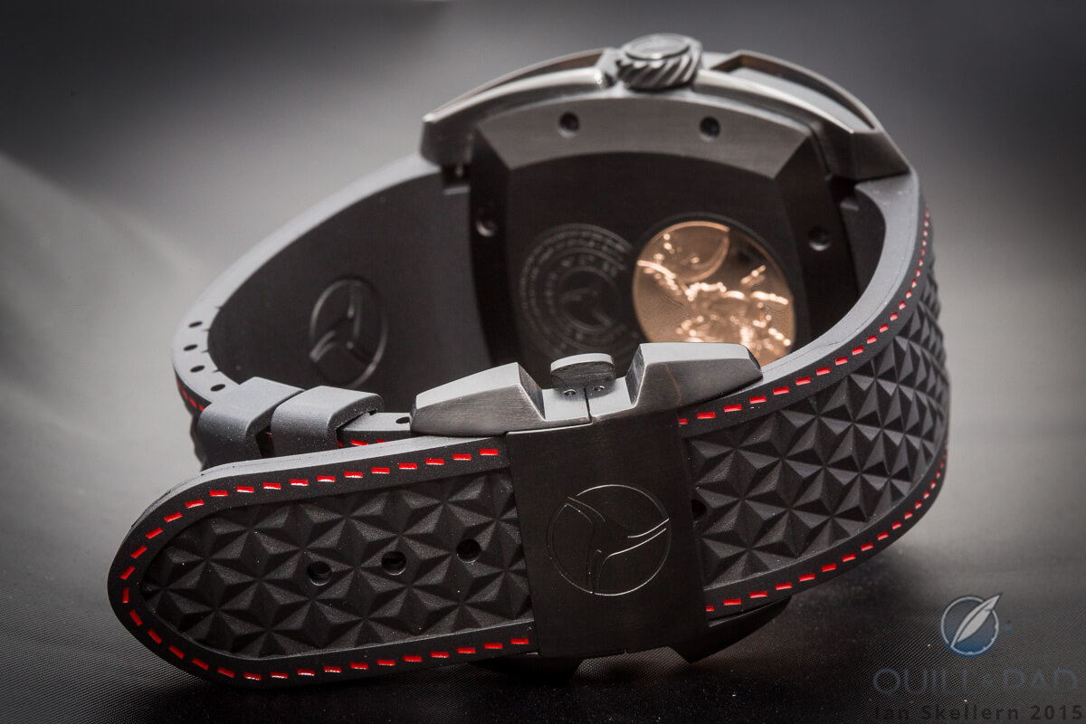 Molded rubber strap with Mars-red stitching on the Cyrus Klepcys
