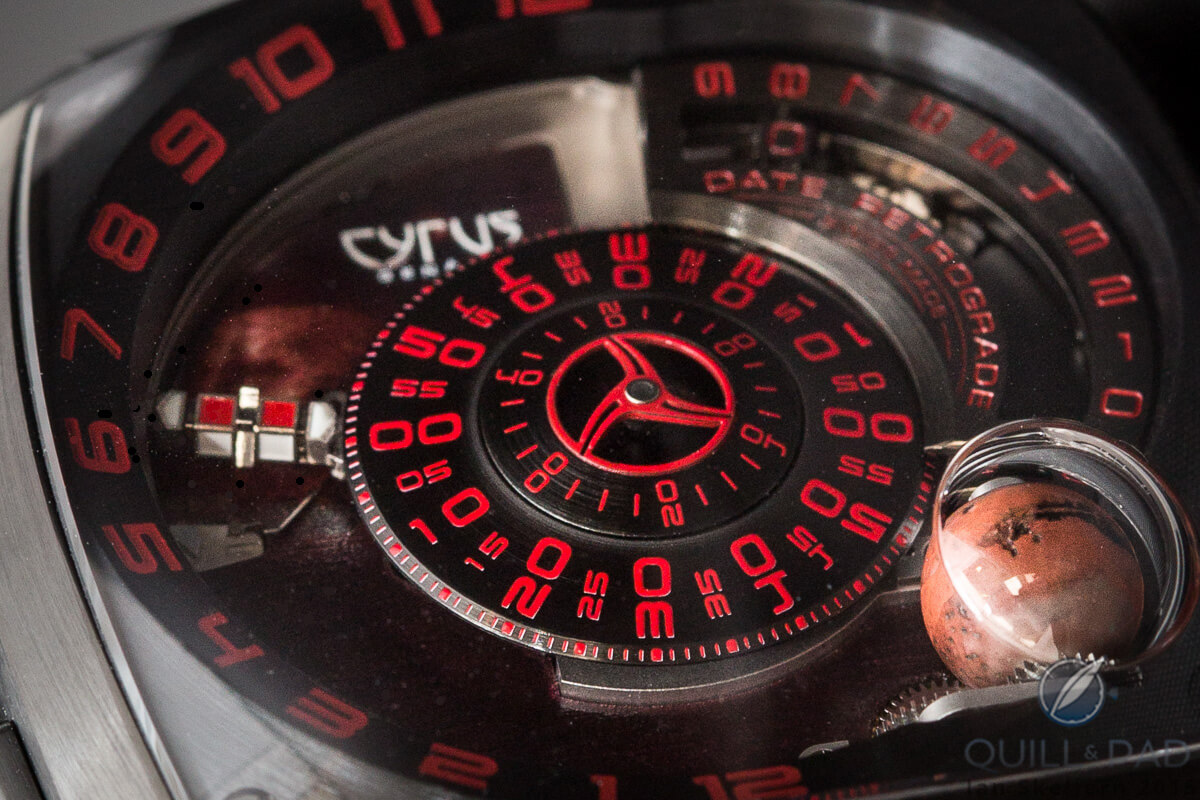 Close up look at the dial of the Cyrus Klepcys Mars: you can see the miniature Rubik's Cube-like block pointer indicating 00 on the left