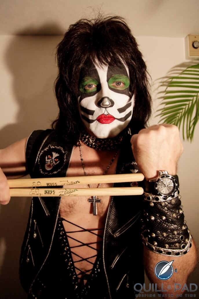 Eric Singer in Kiss catman makeup wearing a Ball watch