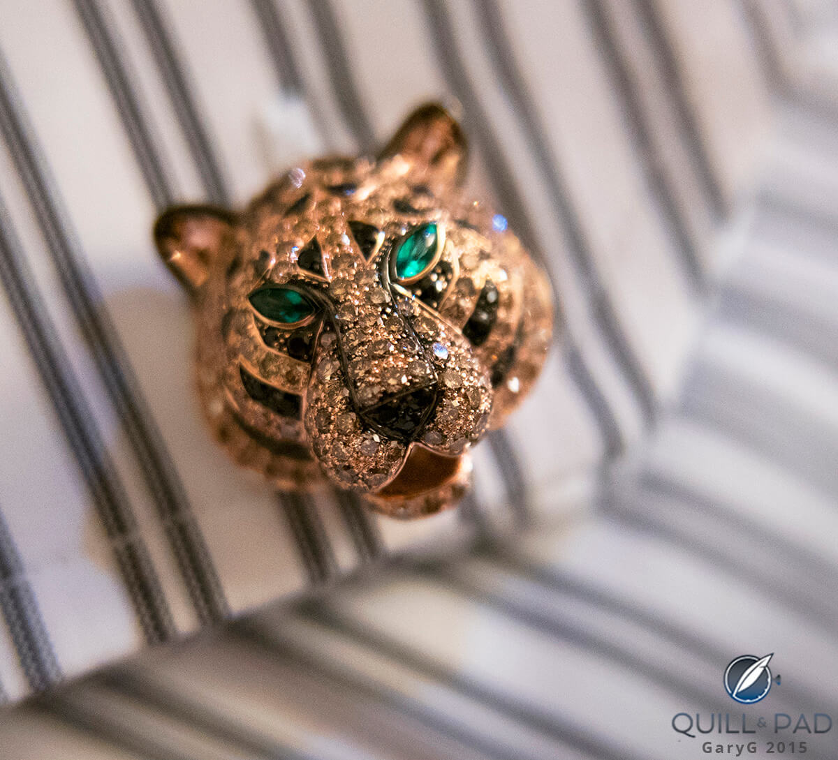 Dressing for dinner: Boucheron tiger cufflink and Charvet shirt