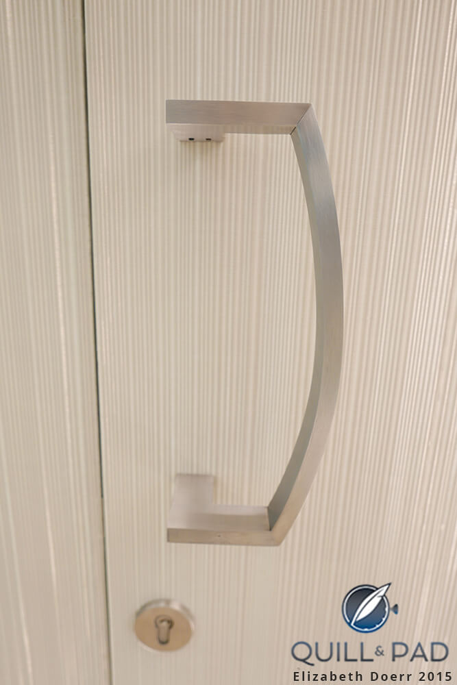 An eye for detail: metalized wallpaper by Sophie Mallebranche and door handles that resemble one-half of the famous Richard Mille tonneau-shaped case