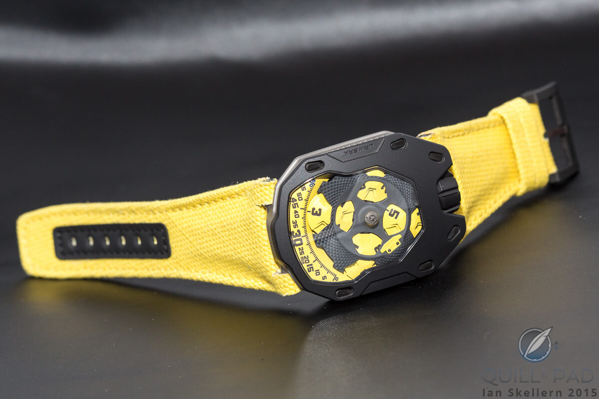 The bright yellow of the satellites and indications of the Urwerk UR-105 continues through to the strap