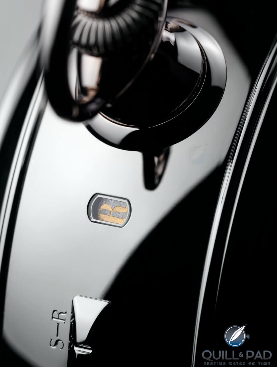 The small window in the center of this image indicates the alarm function, with the selector switch at the bottom of the photo