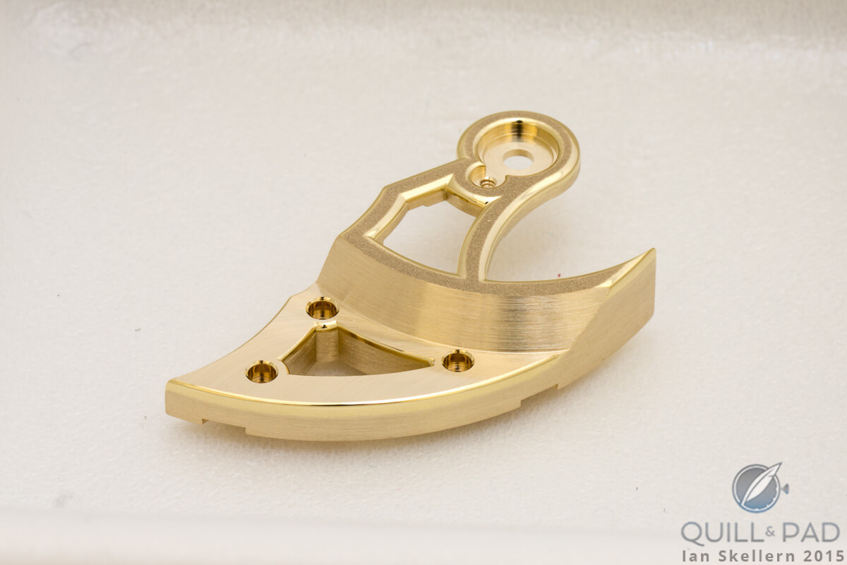 The underside of the mainspring barrel bridge of the Romain Gauthier Logical One is finished as carefully as the visible side