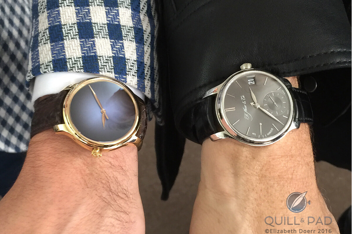 H. Moser & Cie Endeavour Concept Watch Fumé (left) on the wrist of Edouard Meylan and Endeavour Perpetual Calendar in platinum on the wrist of U2 bassist Adam Clayton at the 2016 SIHH