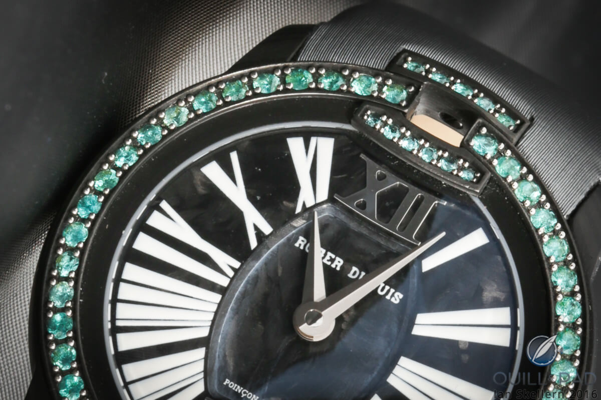 A close look at the gems set directly into the carbon fiber bezel