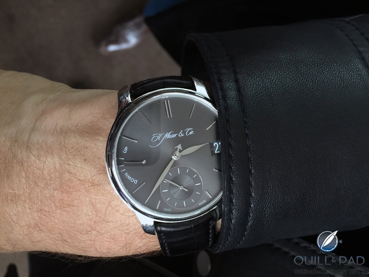 H. Moser & Cie Endeavour Perpetual Calendar in platinum on the wrist of U2 bassist Adam Clayton