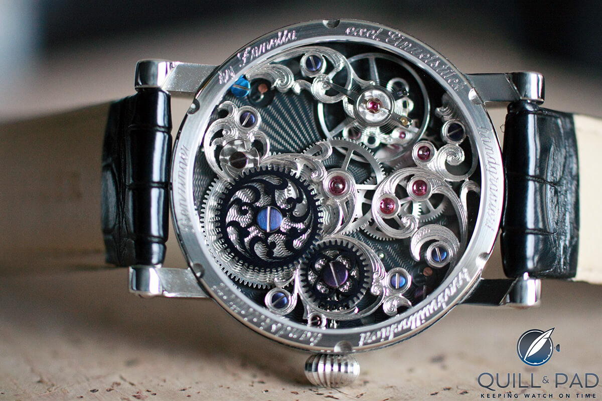 View through the display back to the intricately skeletonized and engraved Benzinger By Zanella