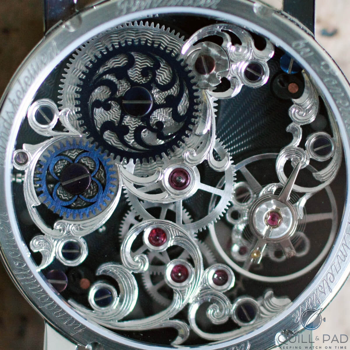View through the display back to the intricately skeletonized and engraved Benzinger By Zanella