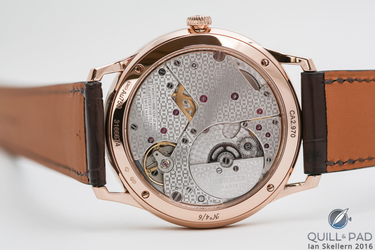 View through the display back of the Close up look at the dial of the Slim d’Hermès Email Grand Feu