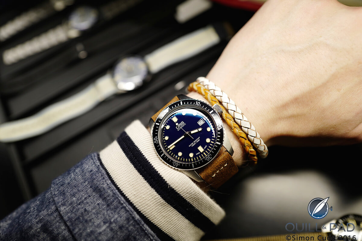 The Oris Divers Sixty-Five on a stunning brown vintage-style leather strap