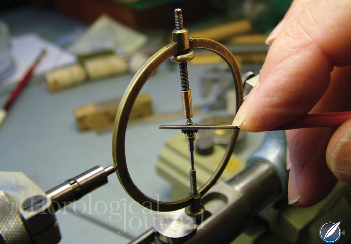 Pinion face polished in a swing tool for Derek Pratt's H4 reconstruction (photo courtesy British Horological Journal)
