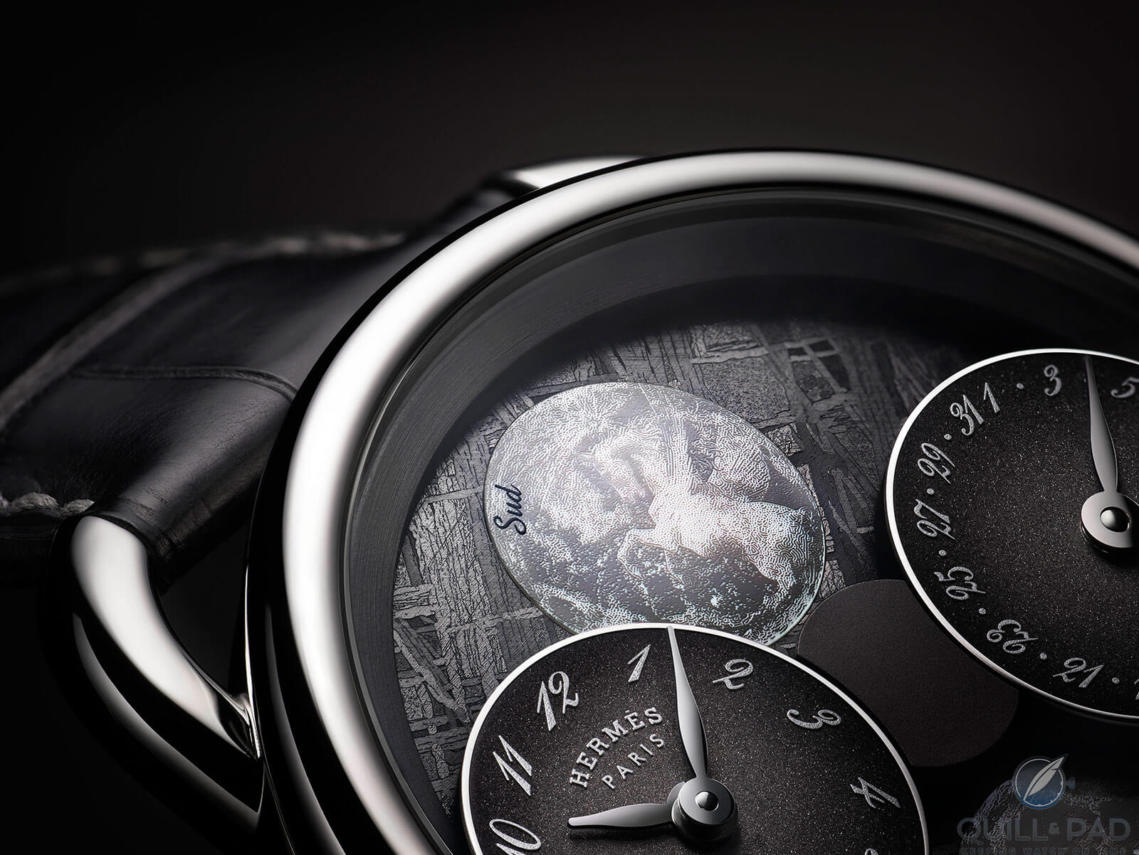 Close up look at the Hermès Arceau L’Heure De La Lune with meteorite dial